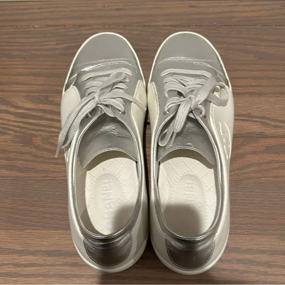 CHANEL Silver and White Reflective Sneakers with Minimalist Design - Picture 3 of 8